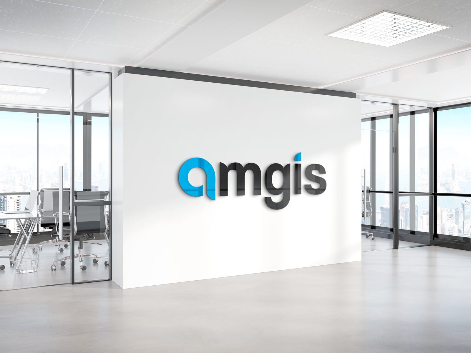 The AMGIS wordmark mounted as dimensional signage on a white office wall